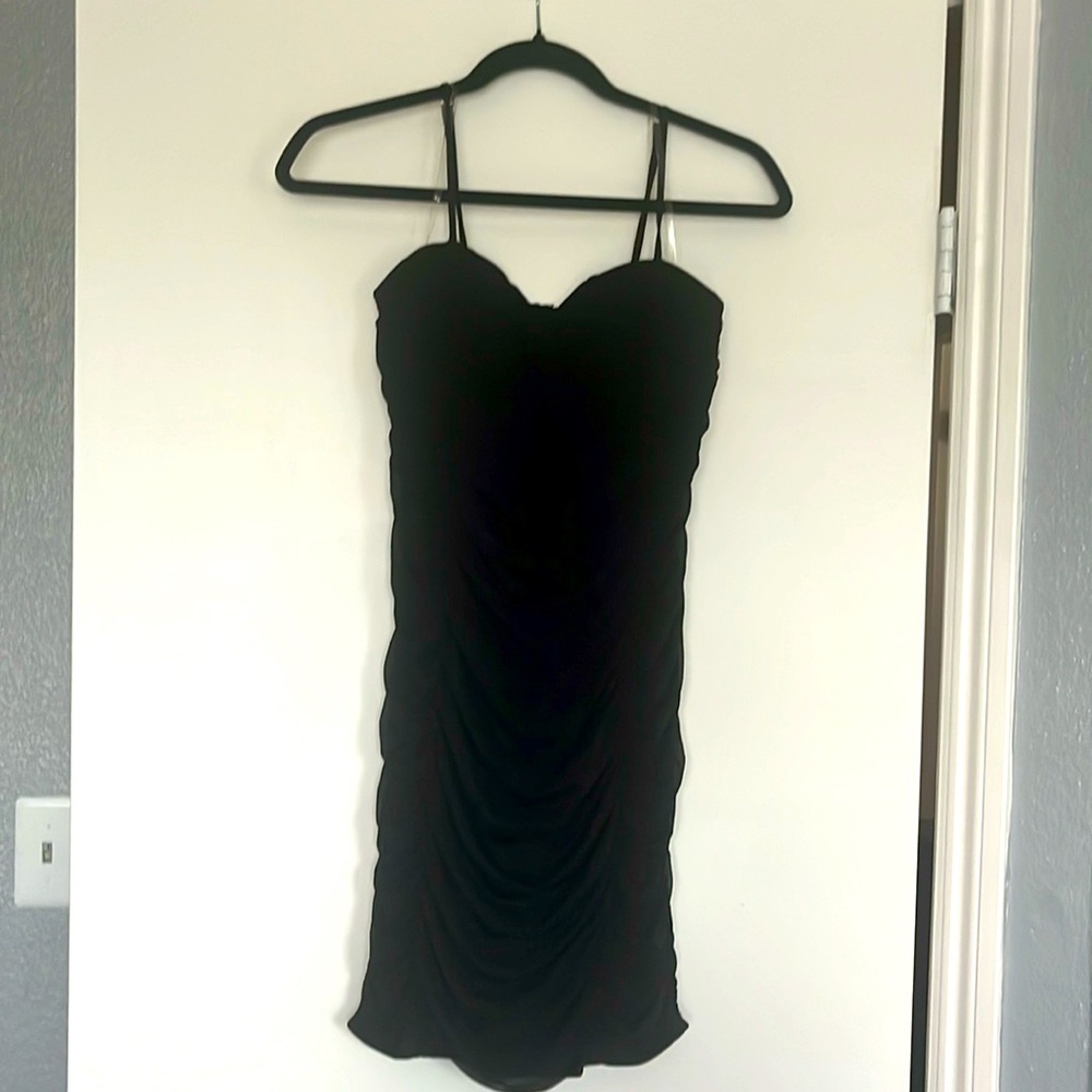 Beautiful stretchy little black dress! Size XL, stretchy, and new with tags!